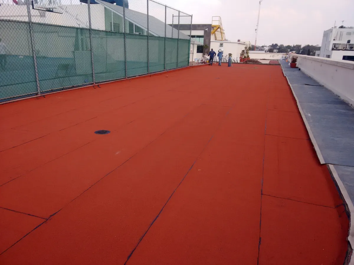 Azotea con prefabricado de gravilla roja